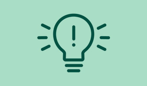Illustration av glödlampa med ett utropstecken i. 